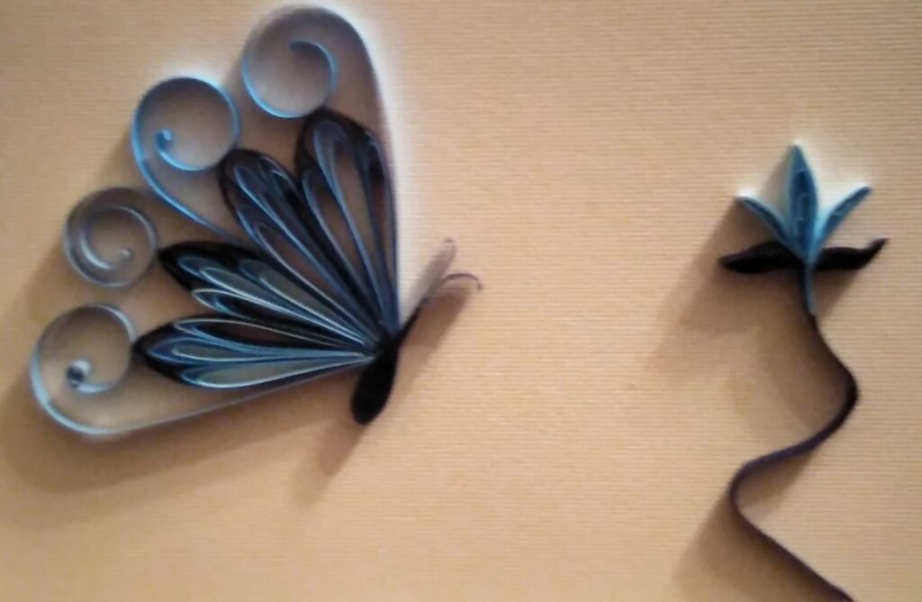 Blue Butterfly and Flower